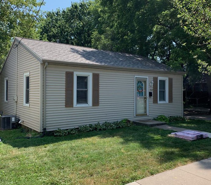 Roof problems in Iowa City due to storm damage.