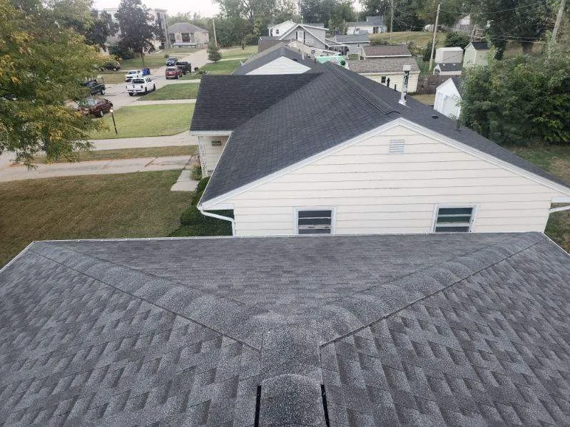 Aerial view of a Williamsburg Grey shingle roof replacement