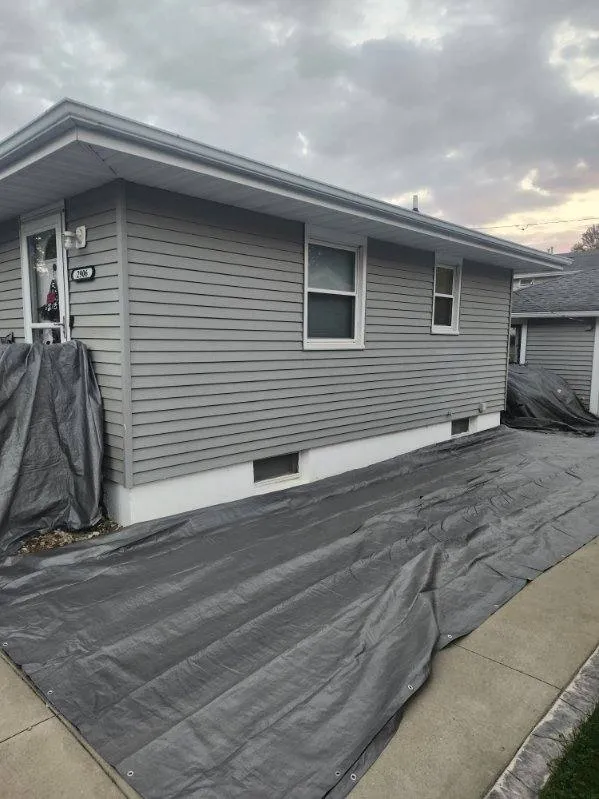 Roof installation in progress on a residential home in Cedar Rapids, IA during a full roof replacement.
