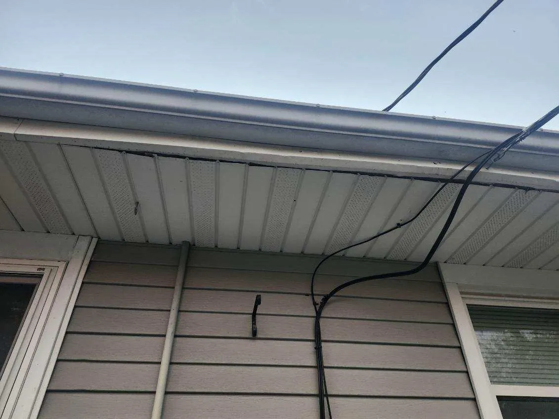 Gutter and soffit detail on a residential home in Cedar Rapids, IA following a full roof replacement.