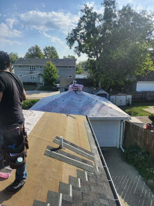 Roof installation in progress on a residential home in Cedar Rapids, IA during a full roof replacement.