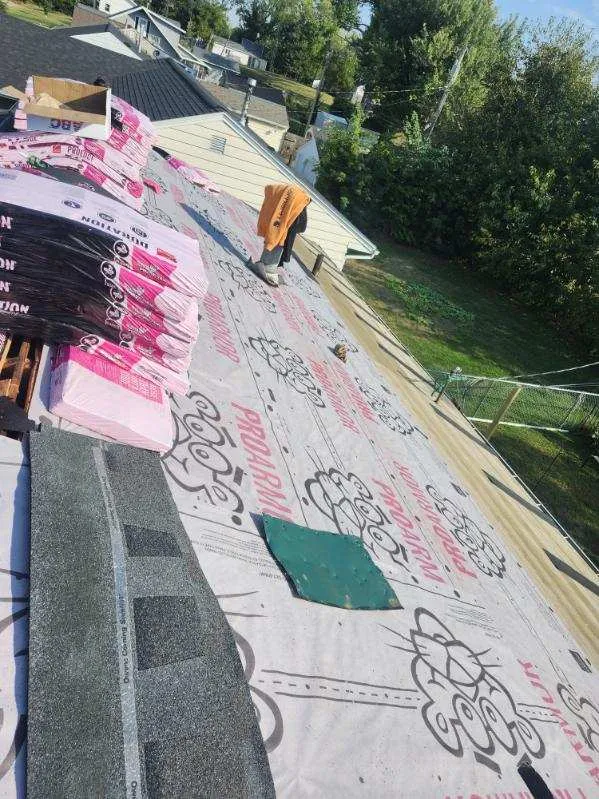 Synthetic roofing underlayment installed during a residential roof replacement in Cedar Rapids, IA.